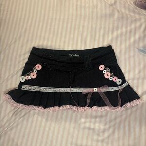Elegant Black Mini Skirt with Pink Button Details